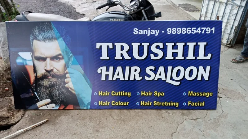 Trushil hair saloon logo