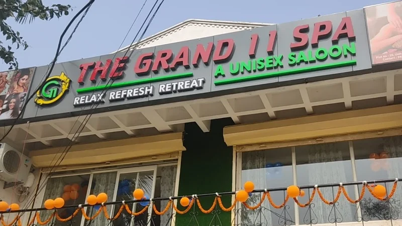 The Grand 11 SPA And Saloon logo