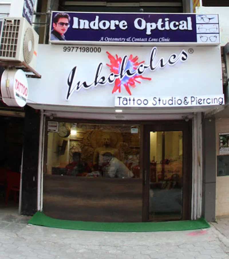 Inkoholics Tattoo AND Piercing STUDIO logo
