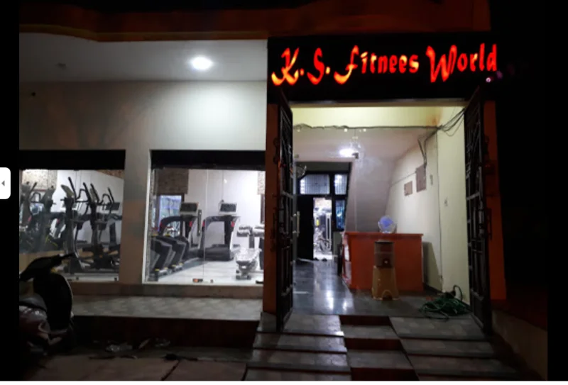 K.S. Fitness World logo