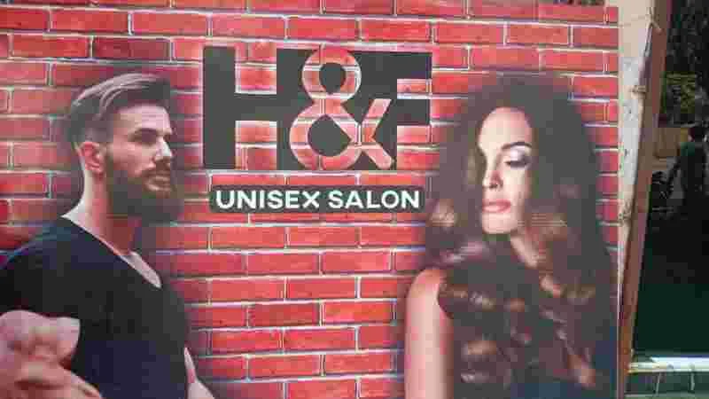 H & F Unisex Salon logo