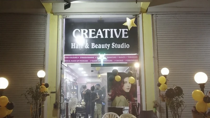 Creative hair & beauty studio logo