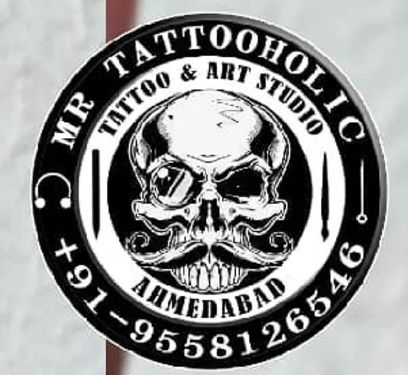 Mr Tattooholic Tattoo And Piercing Studio logo